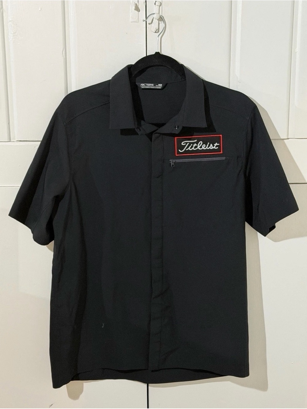 Arc'teryx Men's Black Short-Sleeve Skyline with Titleist golf pro